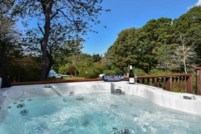 Waterfront home with Hot Tub Firepit and Game Room